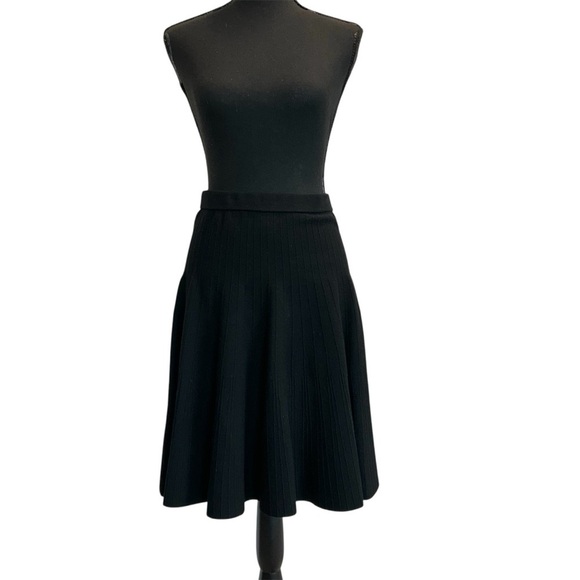 Source Unknown Dresses & Skirts - Black knit A-line mini skirt Sz M classy flowy stretchy pull-on